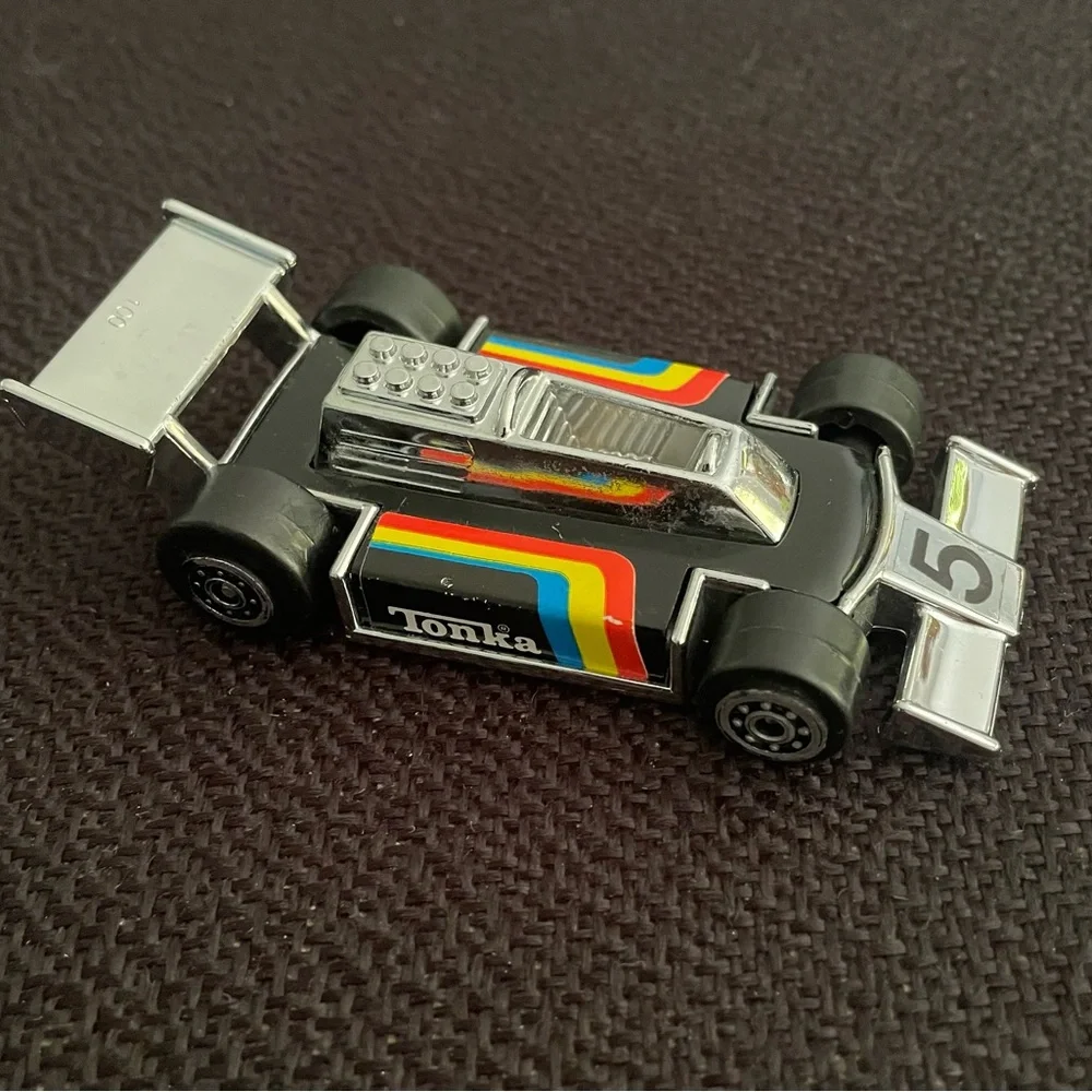 VTG 1979 Tonka black F1 race car w/ rainbow racing stripes